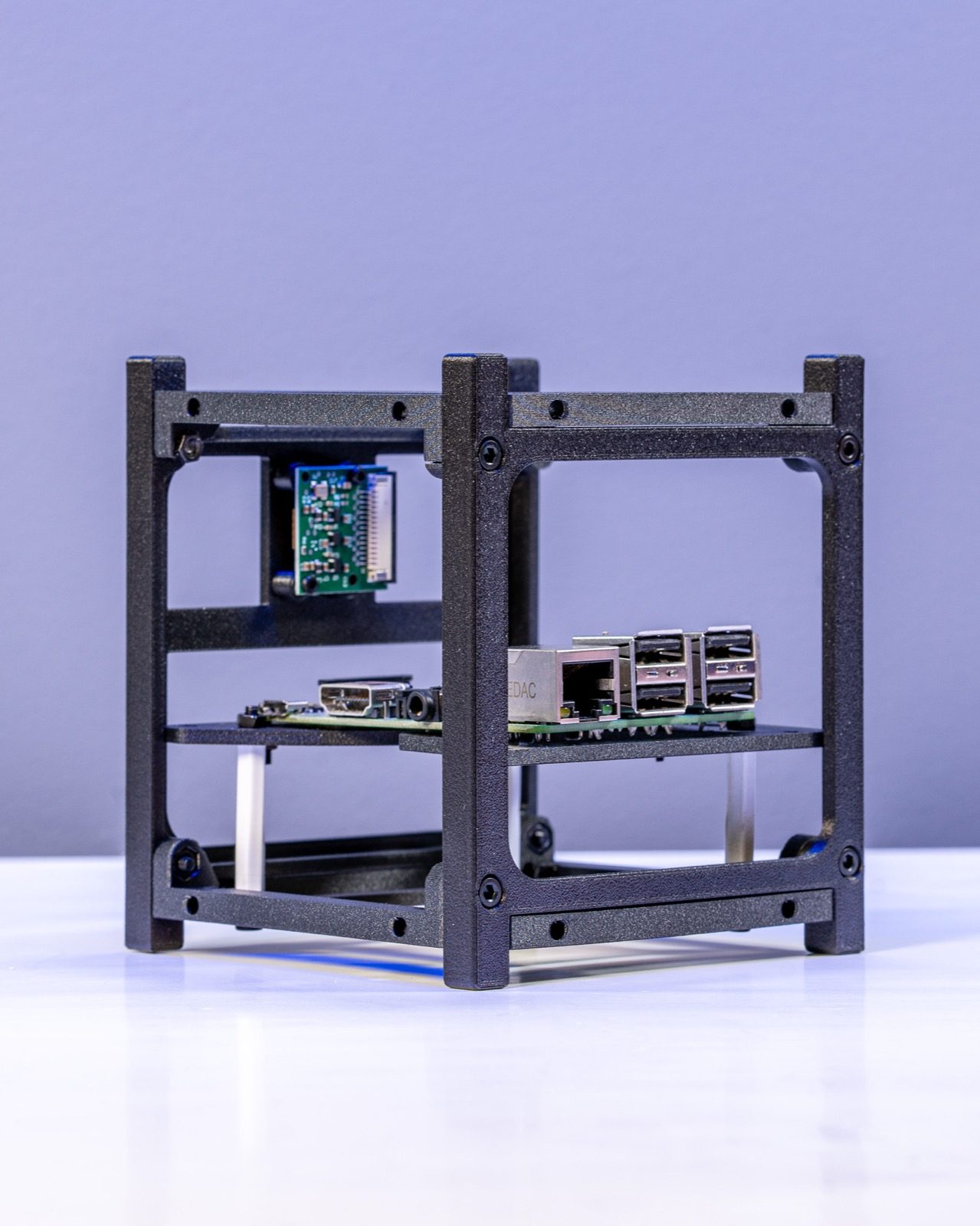 The Raspberry Pi and ports seated in the frame, with room left for added HATs, sensors and modules.
